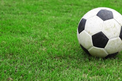 Football On Green Grass